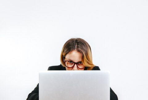 determined-office-worker-looking-camera